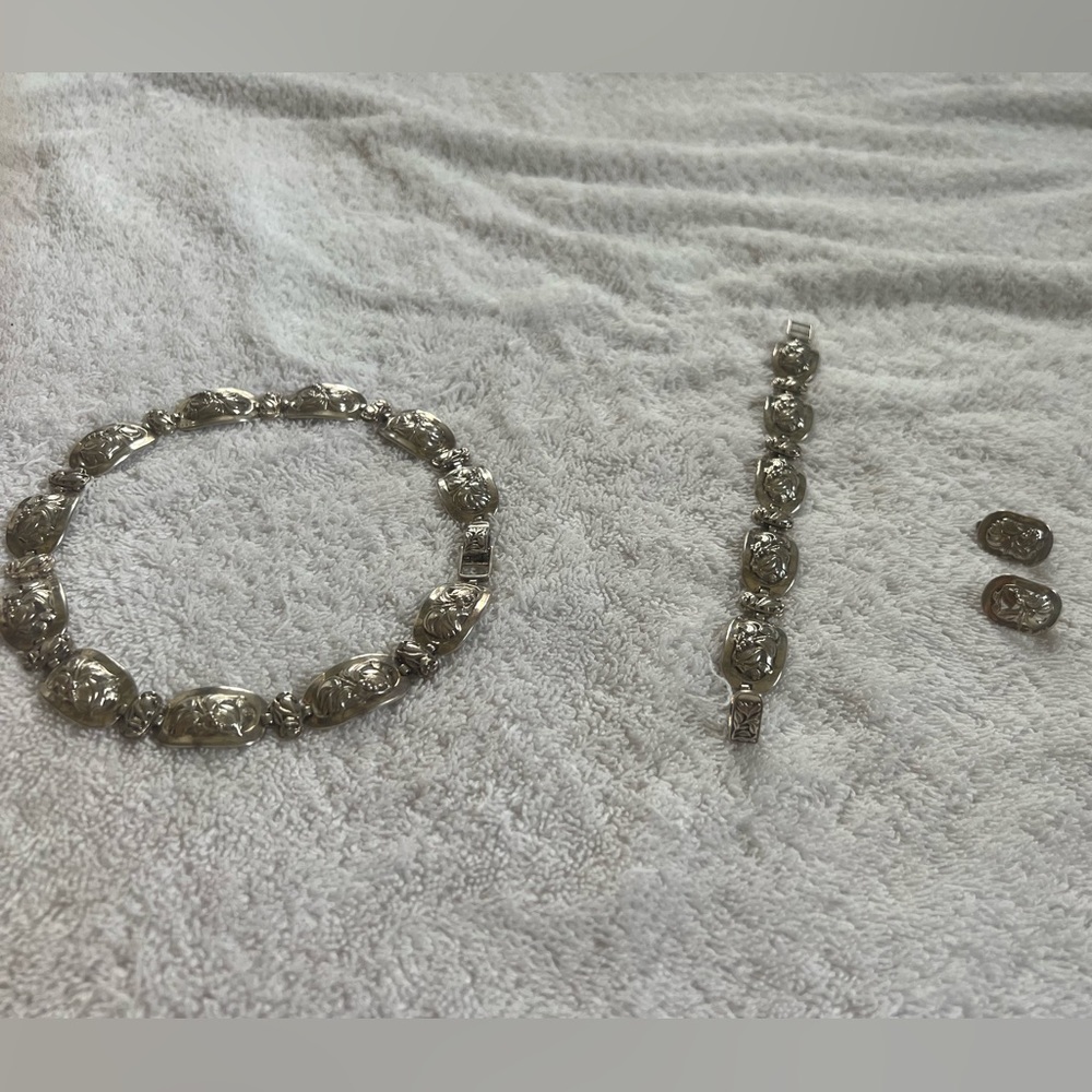 necklace, bracelet and earrings set from silver.